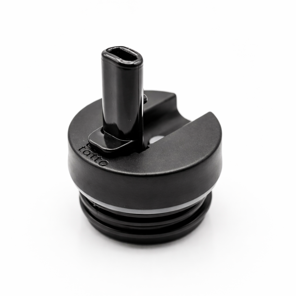 Black drink lid with straw holder on a white background