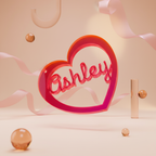 Transparent Heart-shaped sign with the name 'Ashley' on a beige background with ribbons and balls.
