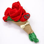 Red rose plush bouquet with green leaves and a beige ribbon on a white background