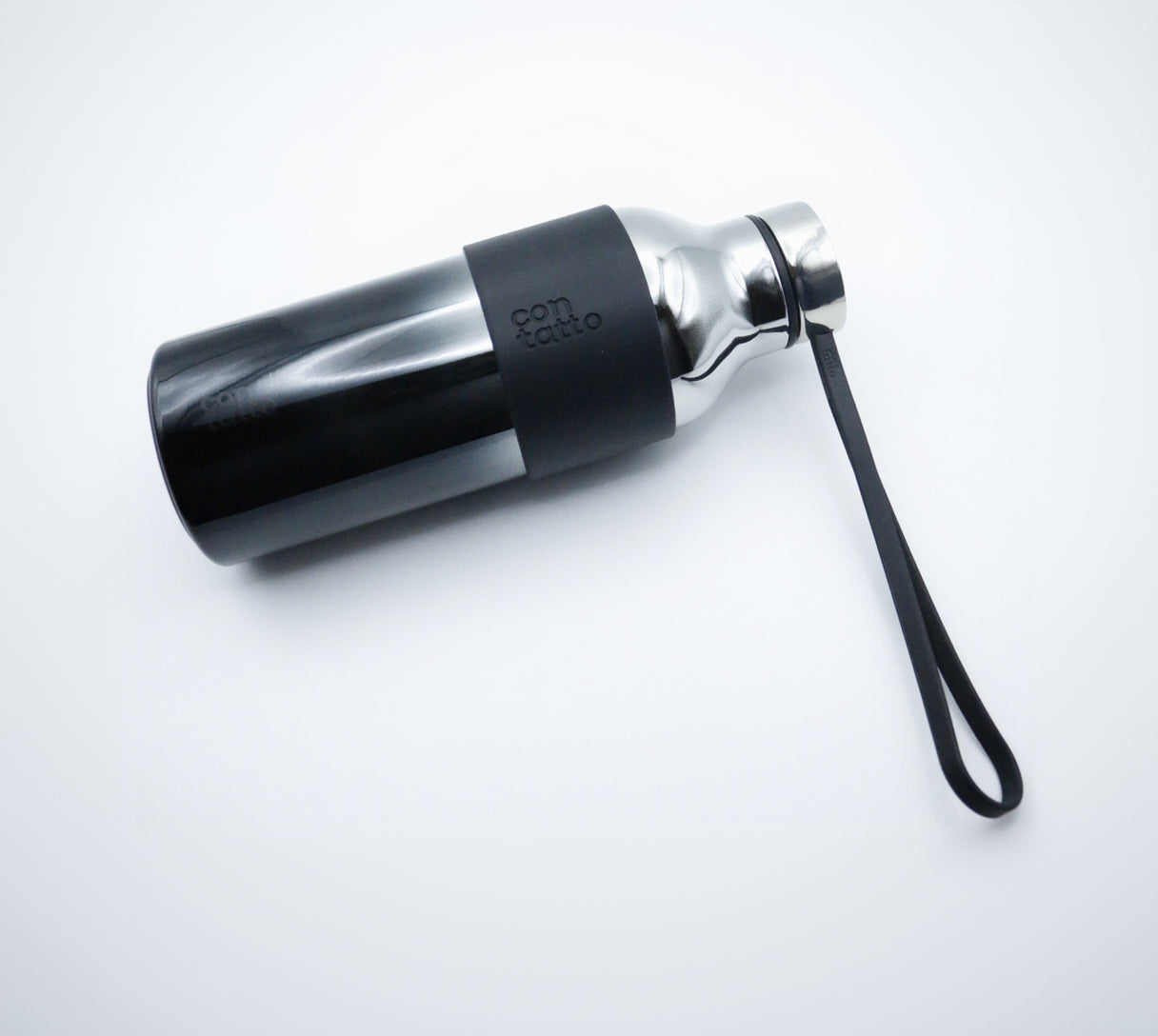 Silver and black water bottle with a strap on a white background