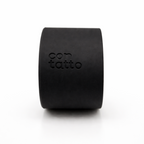 Black cylindrical silicone grip band on a white background