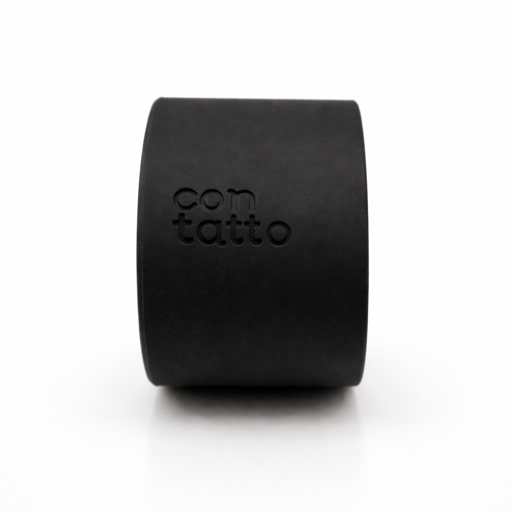 Black cylindrical silicone grip band on a white background